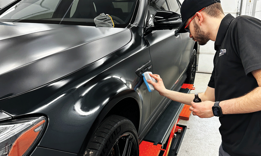 Davien from Prestige Auto Appearance applying Ceramic Coating to a Mercedes Benz at our Automobile Aesthetic and Detailing Studio in Lehigh Valley, Allentown. Professional ceramic coating service for ultimate paint protection and shine.