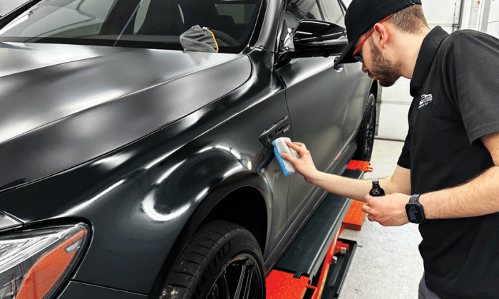 Davien from Prestige Auto Appearance applying Ceramic Coating to a Mercedes Benz at our Automobile Aesthetic and Detailing Studio in Lehigh Valley, Allentown. Professional ceramic coating service for ultimate paint protection and shine.